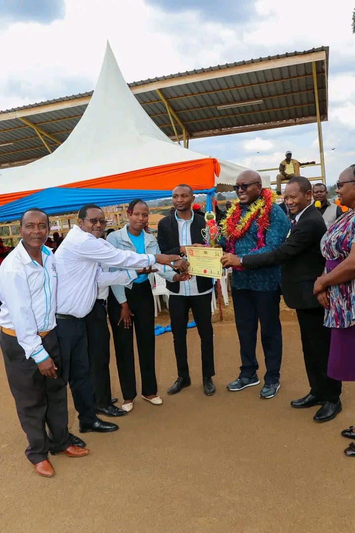 Our Team lead by our Sacco Chairman, receiving an award at the ICA annual event.